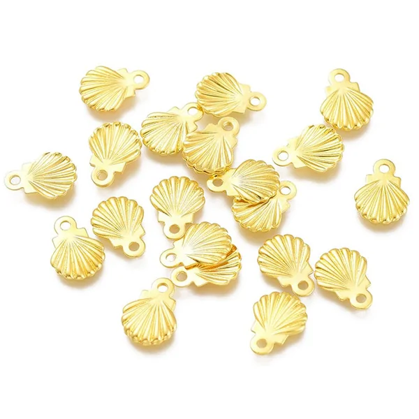 10 mini breloques / pendentifs mini coquillages - 7,5 mm - acier inoxydable doré
