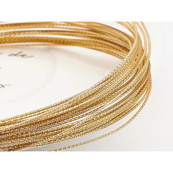 10 mètres de fil de cuivre texturé - doré brillant - 0,8 mm