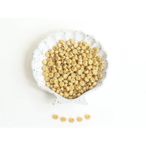 200 perles lettres dorées – Moutarde