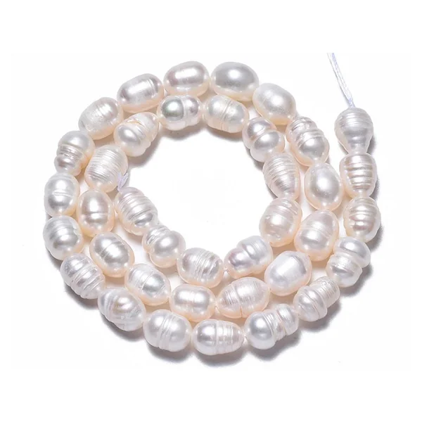 20 perles de culture forme grain de riz - 10 mm env