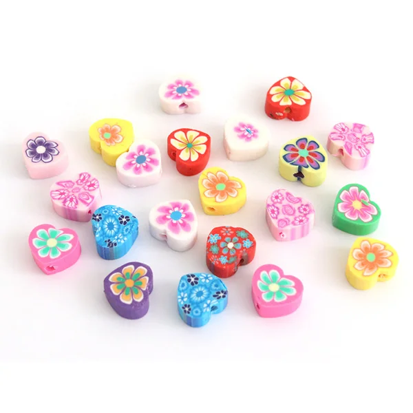 20 perles en pâte polymère - cœurs effet millefiori - multicolore