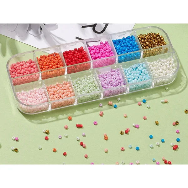 Boite de 12 couleurs estivales de perles de rocailles rondes - 2mm - 3000 pcs environ