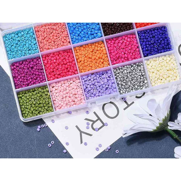 Boite de 15 couleurs variées de perles de rocailles rondes 8/0 - 3mm env.