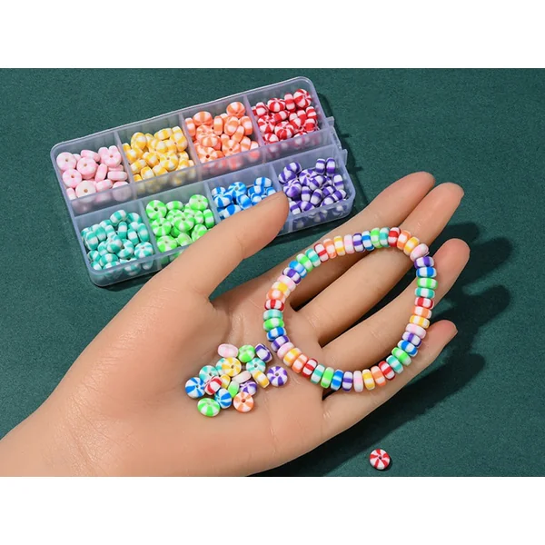 Boite de 8 couleurs de perles heishi épaisses rayées