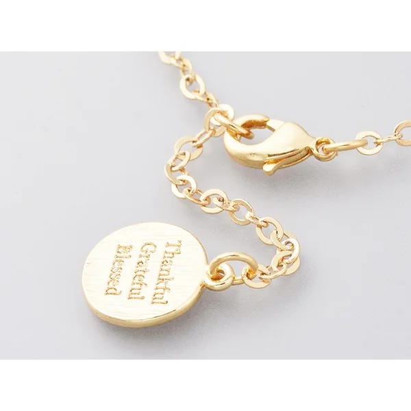 Bracelet avec véritables perles de culture et chaine doré à l'or fin 18K