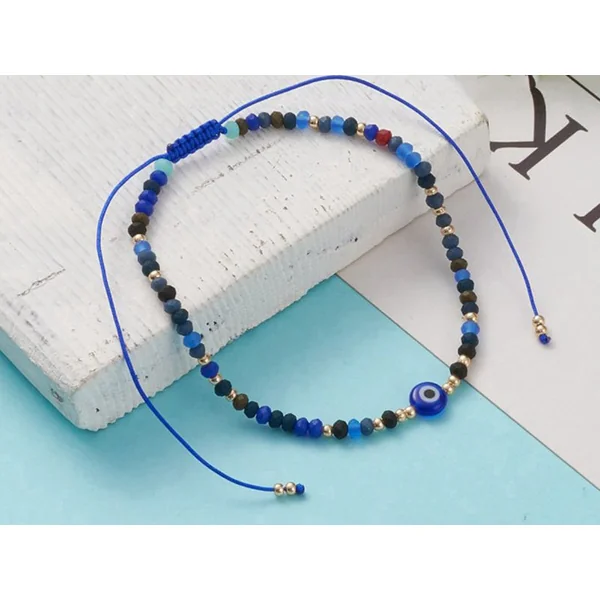 Bracelet perles œil bleu - porte bonheur - taille ajustable
