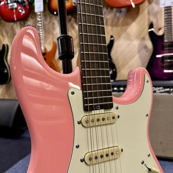 Guitare Schecter Nick Johnston Signature HSS – Atomic Coral