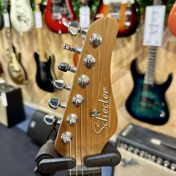 Guitare Schecter Nick Johnston Signature HSS – Atomic Coral