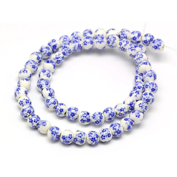 Lot de 10 perles en porcelaine - Fleurs bleues - 6 mm