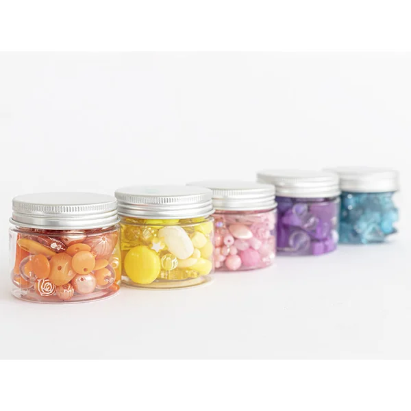 Pot de perles en plastique - nuances de jaune