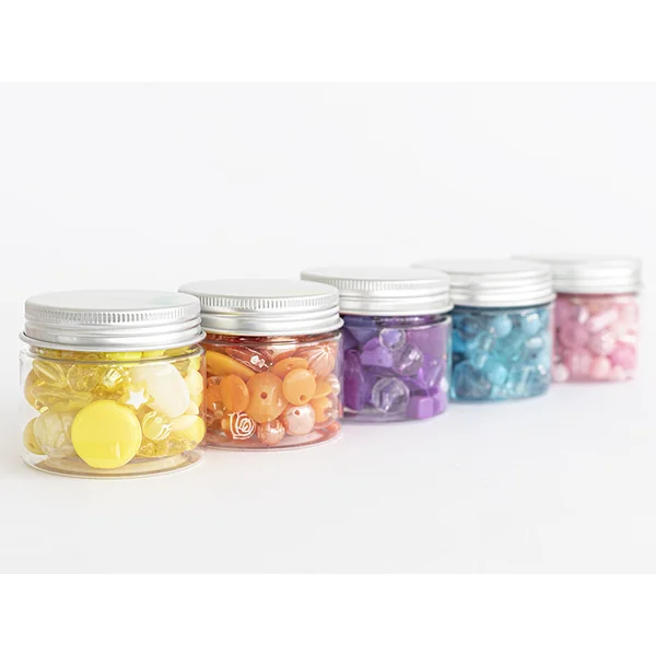 Pot de perles en plastique - nuances de jaune
