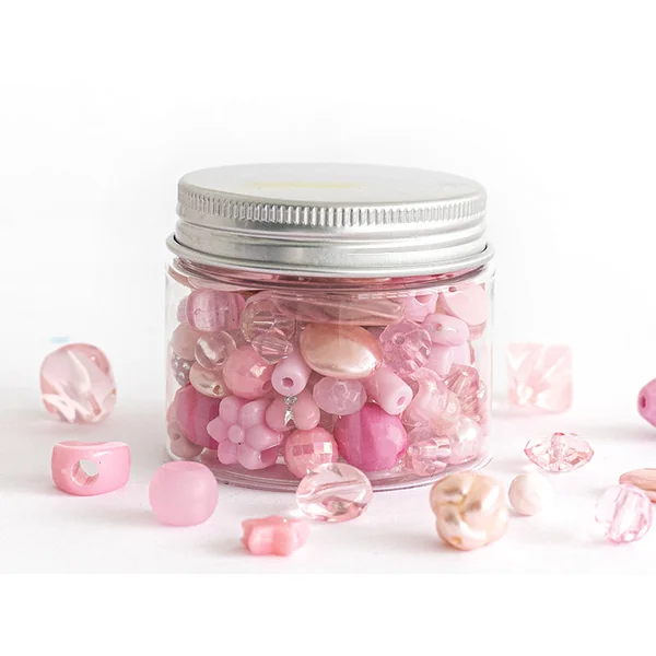 Pot de perles en plastique - nuances de rose