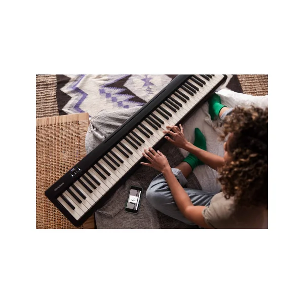 ROLAND FP 10 BK noir mat piano portable Roland